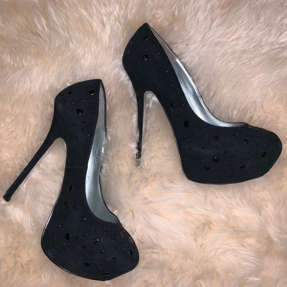 Beautiful black suede heel with black studs.